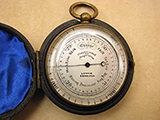 Rare pocket barometer with 'Hurricane' forecast, signed Lennie Edinburgh